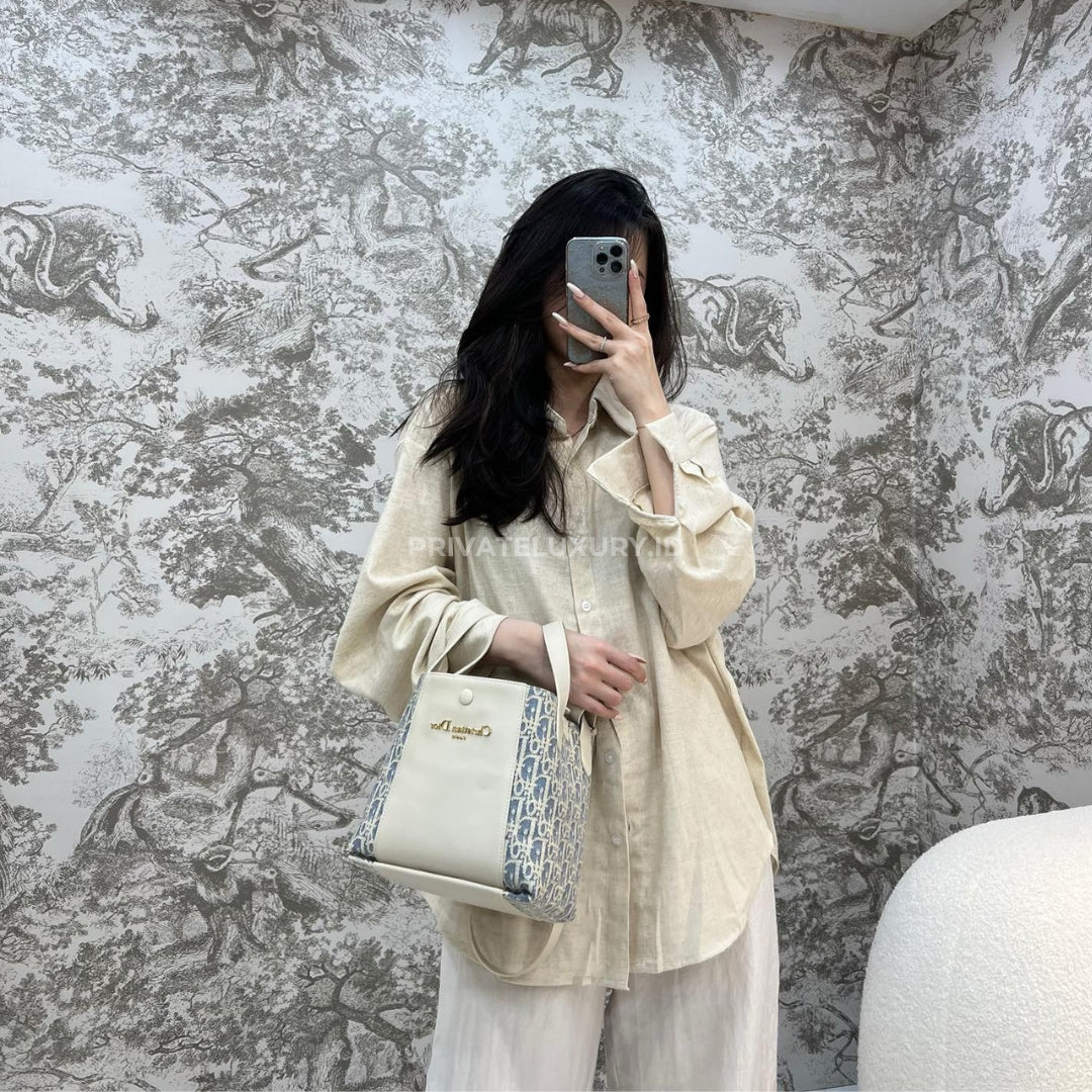 Small Signature Bucket Bag